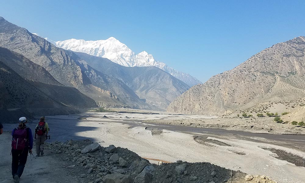 Tourists walking on the bank of Kali Gandaki